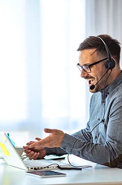 Man attending a free webinar on his laptop