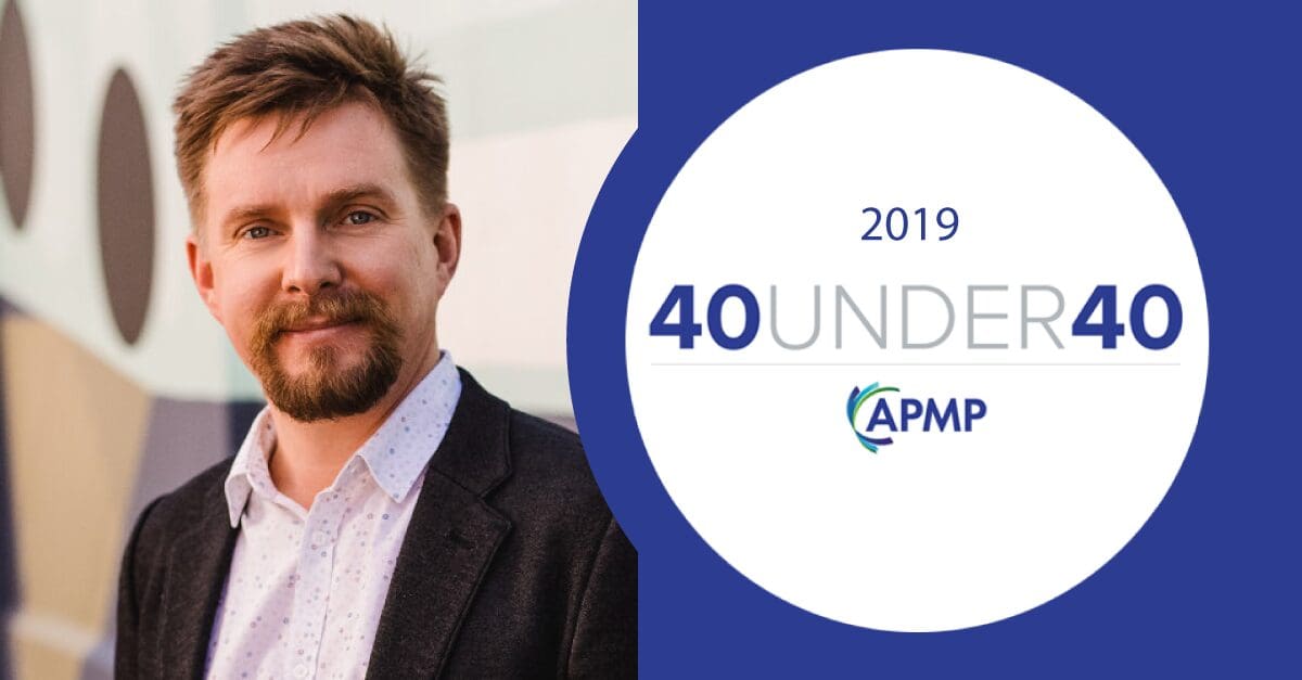 APMP 40 under 40 award emblem with APMP logo and photo of 2019 winner Richard Southern of BidWrite